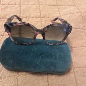 Gucci sunglasses.